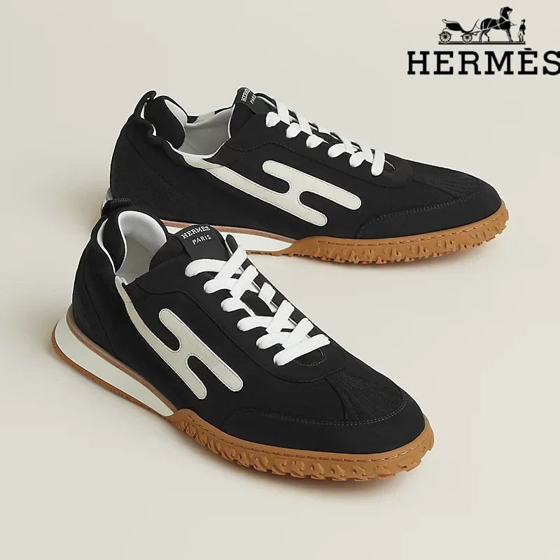 Herm¨¨s Black and White Bouncing Sneakers
