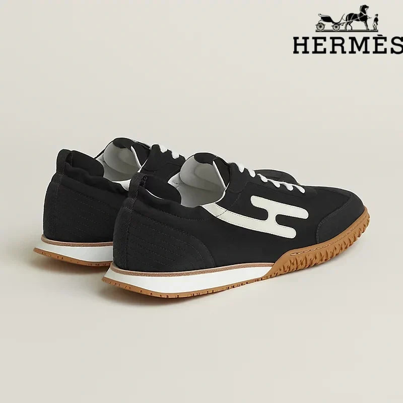 Herm¨¨s Black and White Bouncing Sneakers