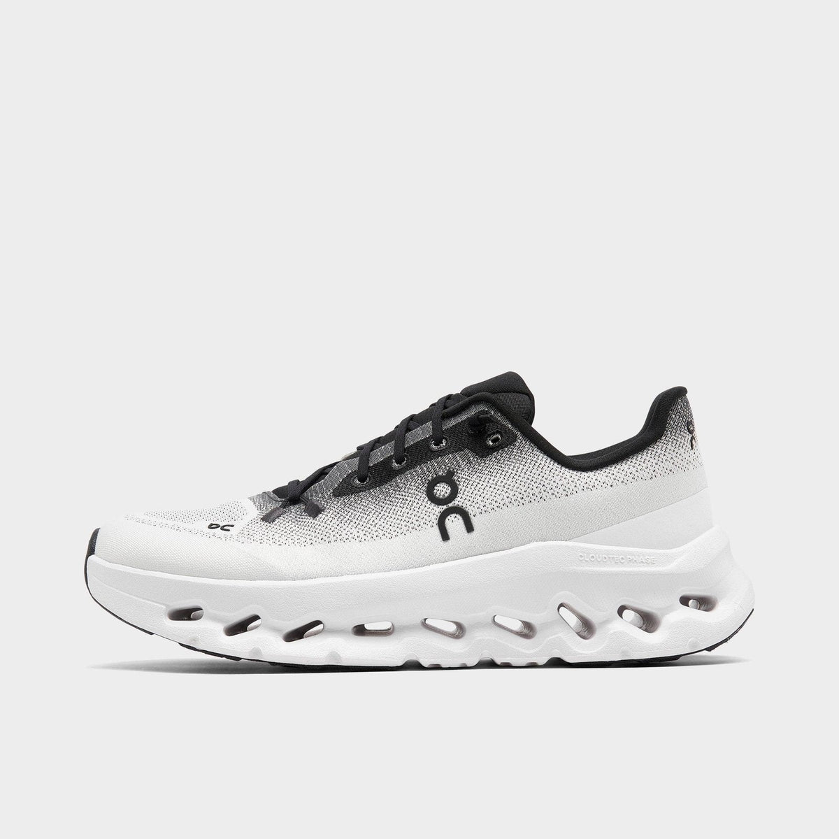 ON Cloudtilt trainers black ivory